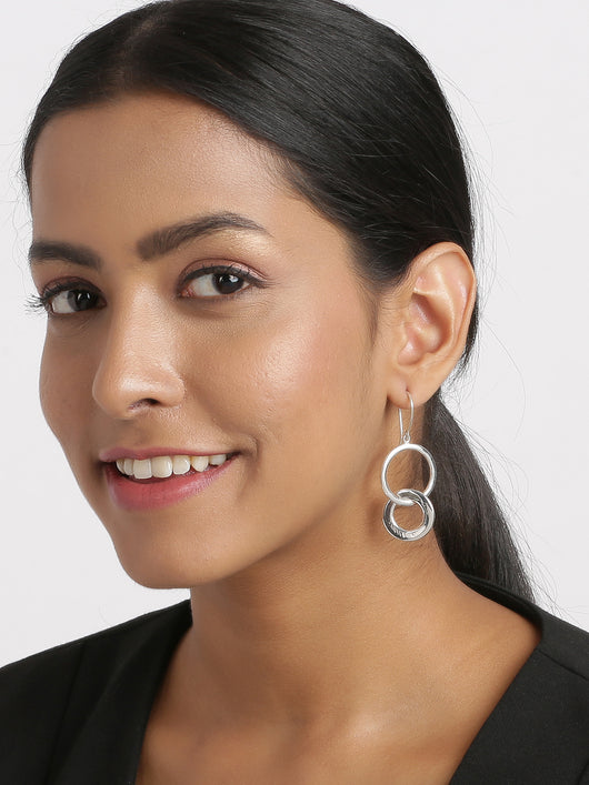 Hoops earrings on girl's ear